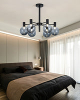 Selva Black Curated Mouth-Blown Frosted Glass Ch warm illuminated room view
