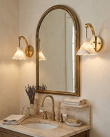 Serena Alabaster Curated Alabaster Wall Sconce warm illuminated room view