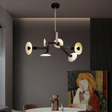 Sheba Classical Curated Finished Iron Chandelier warm illuminated room view