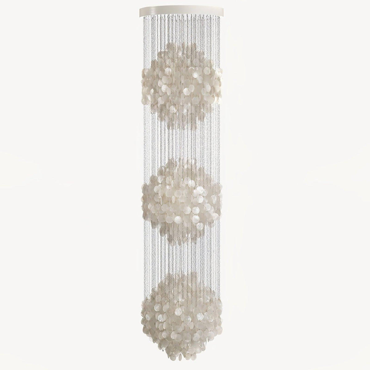 Shell Waterfall Curated Iron & Glass Chandelier – illuminated warm ambiance setting #1