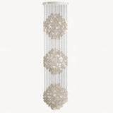 Shell Waterfall Curated Iron & Glass Chandelier – illuminated warm ambiance setting #1