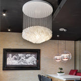 Shell Waterfall Curated Iron & Glass Chandelier warm illuminated room view