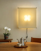 Silque Curated Washi Paper Wall Sconce – illuminated warm ambiance setting