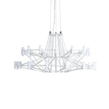 Sky Ballet Curated Optical Acrylic Chandelier – illuminated warm ambiance setting #1