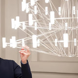 Sky Ballet Curated Optical Acrylic Chandelier – handcrafted surface texture