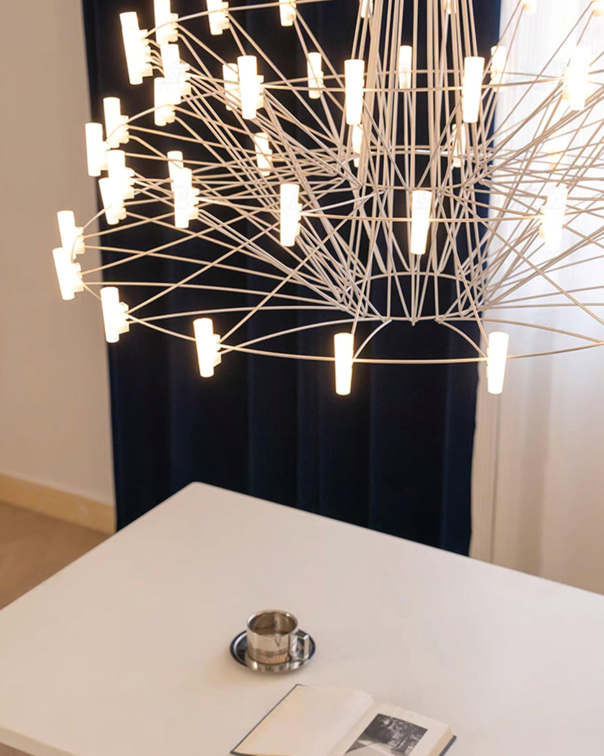 Sky Ballet Curated Optical Acrylic Chandelier – illuminated warm ambiance setting
