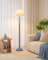 Skylisse Floor Curated Iron & Glass Floor Lamp – illuminated warm ambiance setting