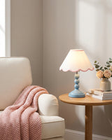 Skylisse Curated Iron & Glass Table Lamp warm illuminated room view