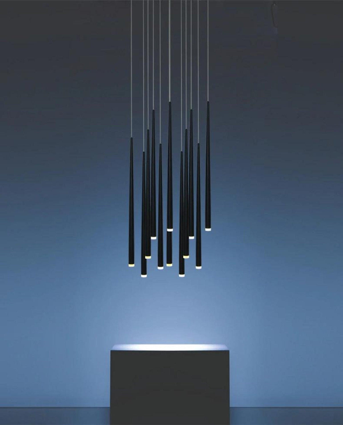 Slender Cone Curated Iron & Glass Chandelier installed in residential dining space