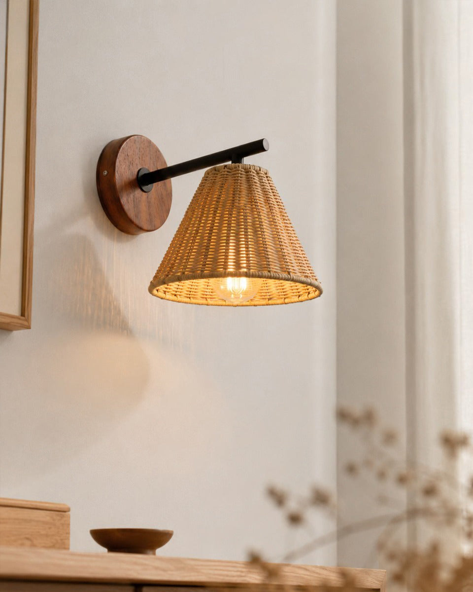 Sovara Rattan Curated Woven Rattan Wall Sconce installed in residential dining space