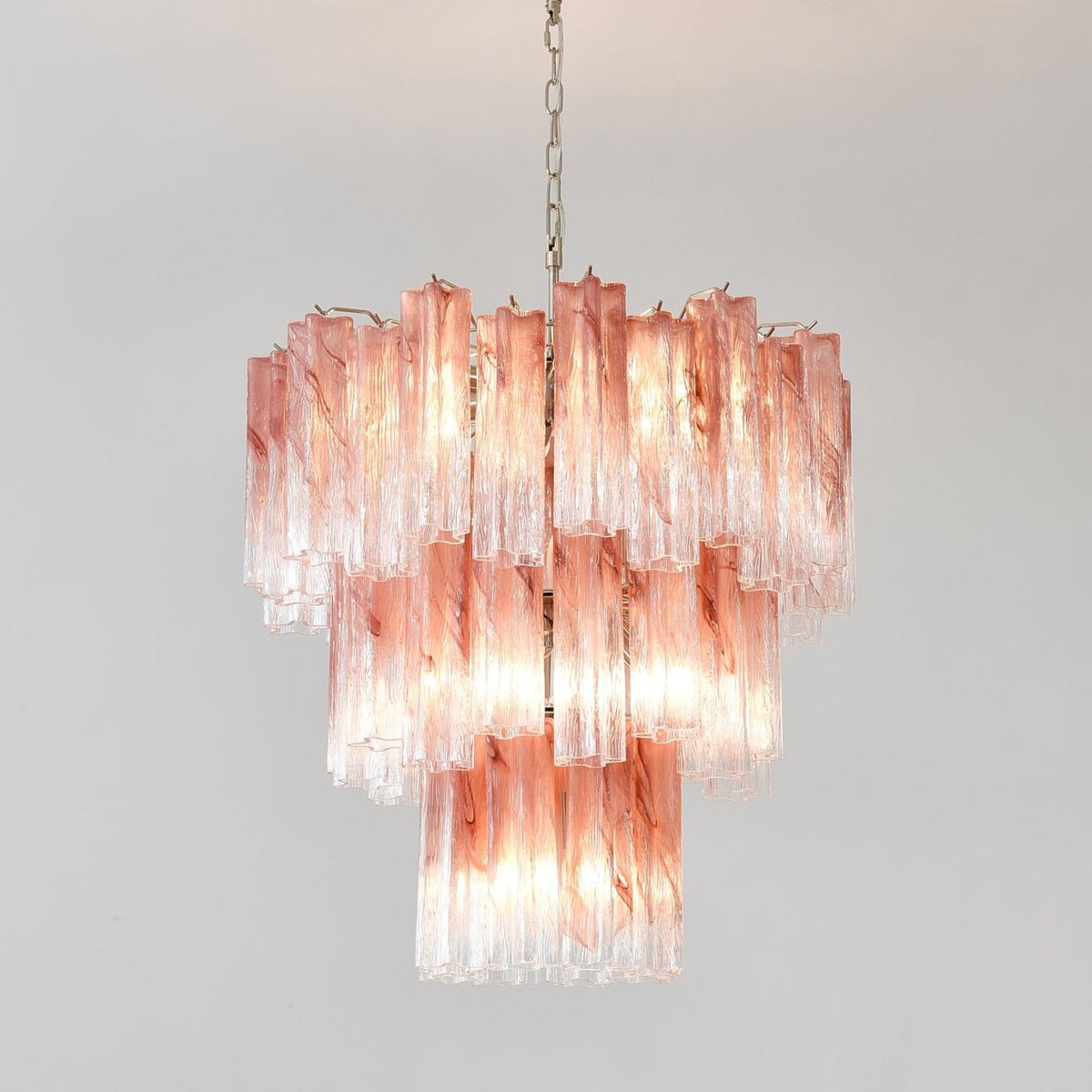 Pink Glass Tubes Curated Mouth-Blown Frosted Gla warm illuminated room view