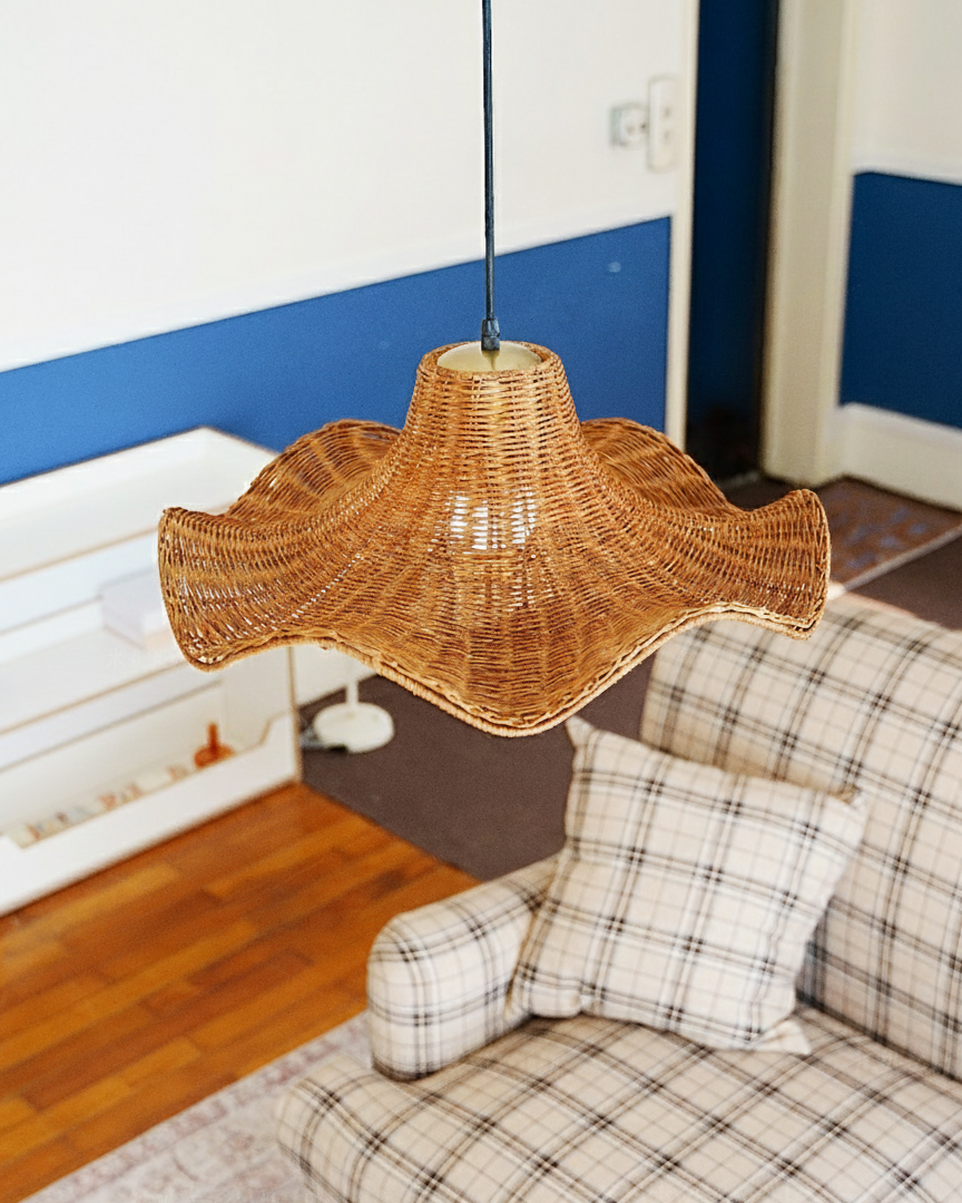 Straw Pleat Curated Woven Rattan Pendant Light installed in residential dining space