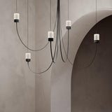 Swaying Curated Mouth-Blown Frosted Glass Chande – unlit natural material contrast