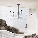 Swaying Curated Mouth-Blown Frosted Glass Chande warm illuminated room view