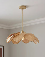 Swaying Curated Woven Rattan Pendant Light warm illuminated room view
