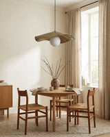 Sylvune Alabaster Curated Alabaster Pendant Ligh installed in residential dining space