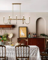 Symphony Curated Iron & Glass Chandelier – spatial dining room perspective