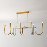 Symphony Curated Iron & Glass Chandelier – illuminated warm ambiance setting #1