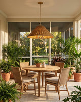 Talora Curated Woven Rattan Pendant Light – illuminated warm ambiance setting