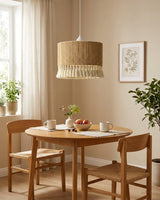 Tasmira Tassel Curated Finished Iron Pendant Lig warm illuminated room view