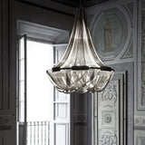 Tassel Aluminum Chain Curated Brushed Nickel Iro installed in residential dining space