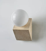 Tavellis Curated Yellow Travertine Wall Sconce – spatial dining room perspective
