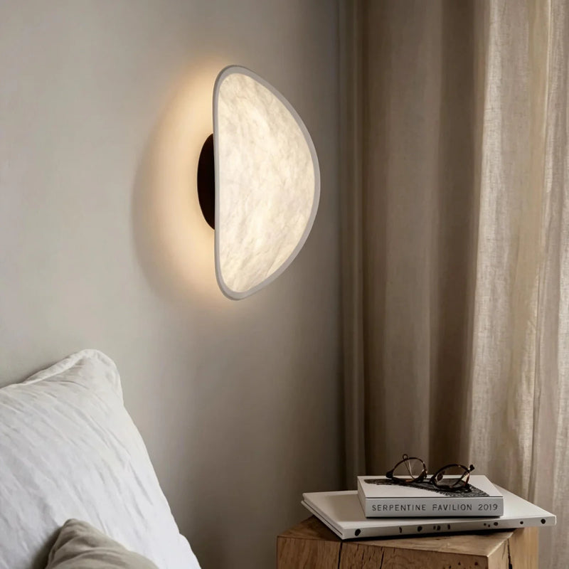 JINSHE Silk & Metal Wall Sconce - Suspended perspective emphasizing the sconce's sculptural form in a Parisian-style dining room.