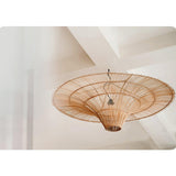 Troy Lighting Costa Mesa Curated Woven Rattan Ch – illuminated warm ambiance setting