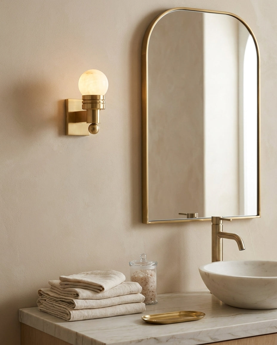 Tupelo Alabaster Curated Alabaster Wall Sconce warm illuminated room view