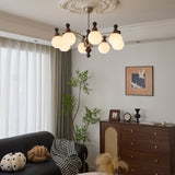 Valerio Curated Mouth-Blown Frosted Glass Chande – illuminated warm ambiance setting