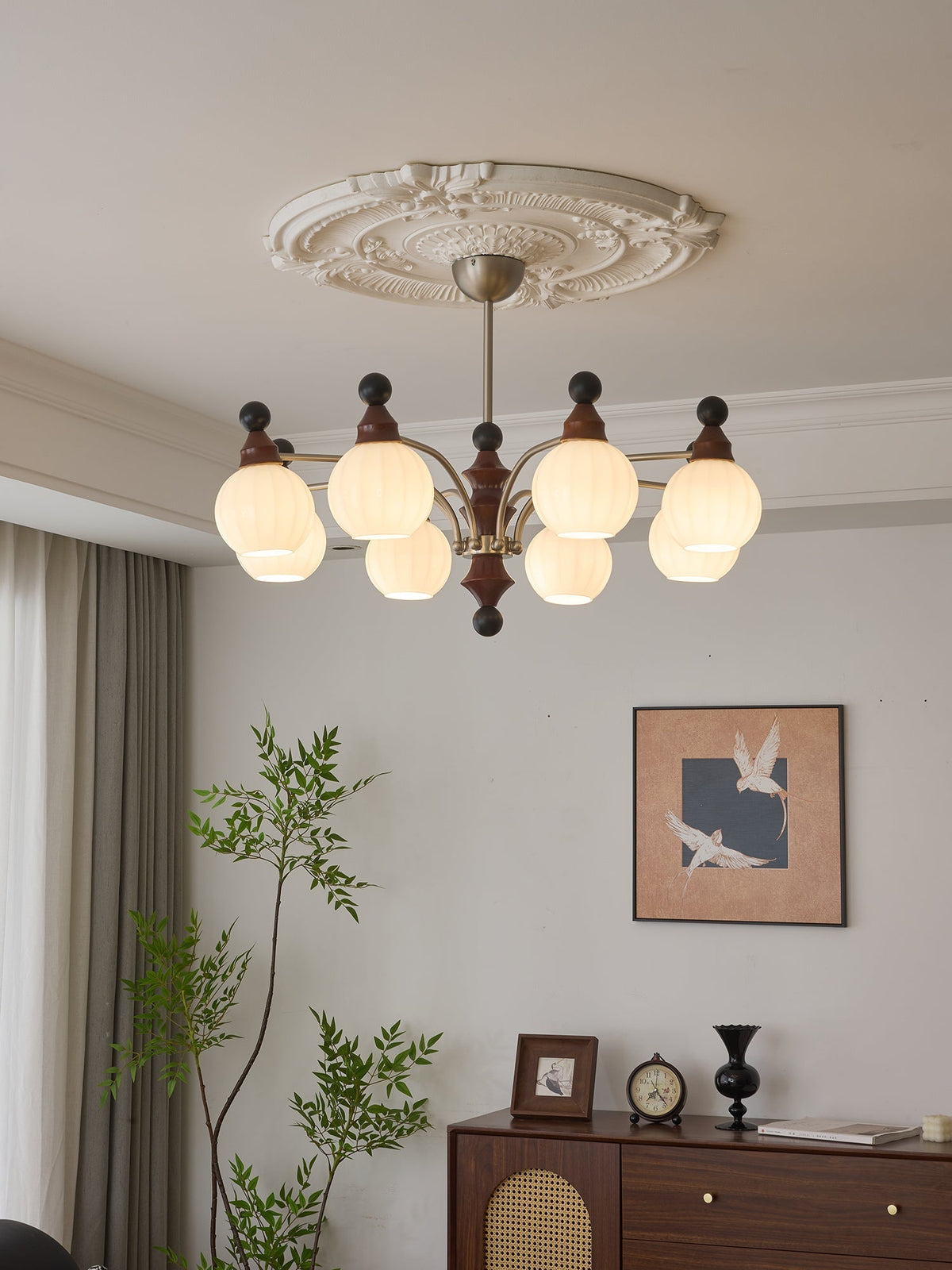 Valerio Curated Mouth-Blown Frosted Glass Chande warm illuminated room view