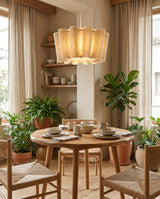 Valerisse Curated Iron & Glass Pendant Light – illuminated warm ambiance setting
