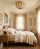 Velisse Curated Iron & Glass Flush Mount Ceiling – illuminated warm ambiance setting