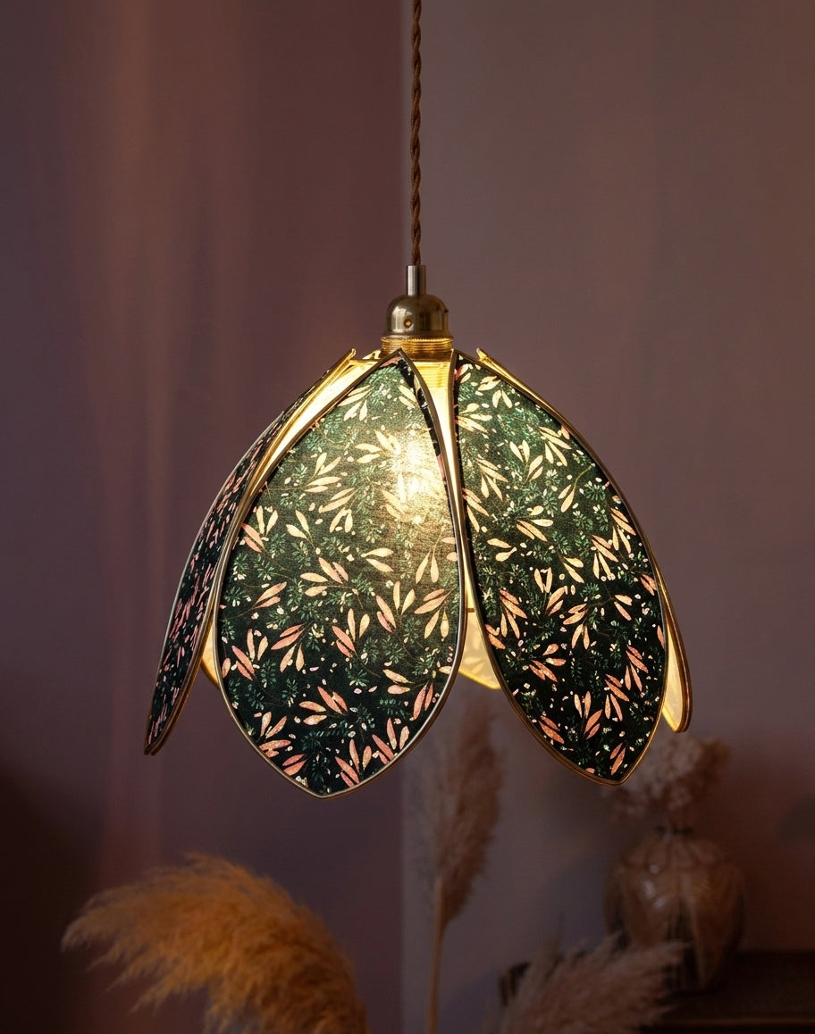 Velmira Curated Iron & Glass Pendant Light – illuminated warm ambiance setting