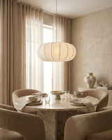 Velorin Curated Iron & Glass Pendant Light – illuminated warm ambiance setting