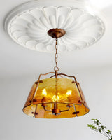 Vintara Curated Amber Art Glass Pendant Light – illuminated warm ambiance setting