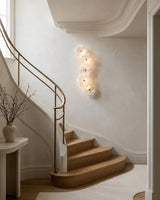 Virelle Alabaster Curated Alabaster Wall Sconce installed in residential dining space