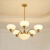 Warre Curated Mouth-Blown Frosted Glass Chandeli warm illuminated room view