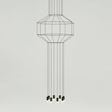 Geometric Lines Curated Iron & Glass Chandelier – spatial dining room perspective