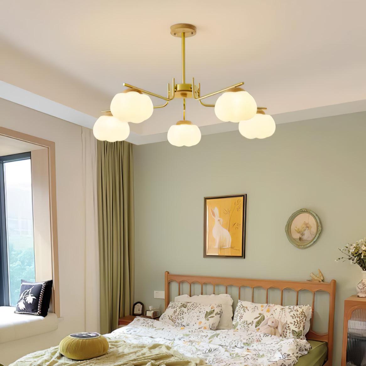 Plastic Cotton Balls Curated Iron & Glass Chande – illuminated warm ambiance setting