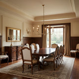 Elara Candle Curated Solid Brass Chandelier warm illuminated room view
