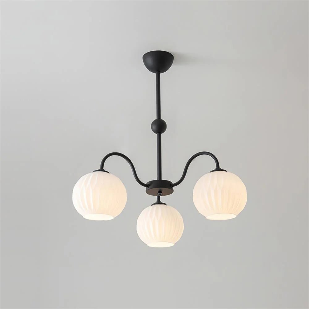 Renee Curated Mouth-Blown Frosted Glass Chandeli – illuminated warm ambiance setting #1
