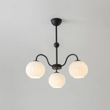 Renee Curated Mouth-Blown Frosted Glass Chandeli – illuminated warm ambiance setting #1